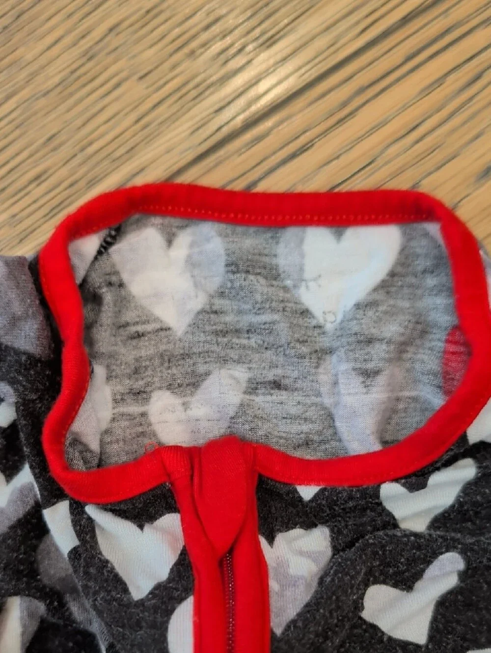 Little Sleepies Black Heart-Print Footed Pajamas with Red Trim